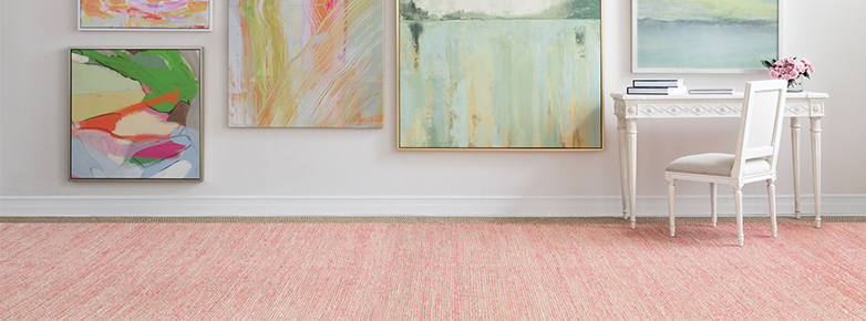 Light coral rug to brighten room