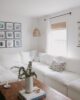 Living room with sheer curtains and a bamboo shade