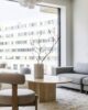 Living room in a high rise apartment with a marble coffee table