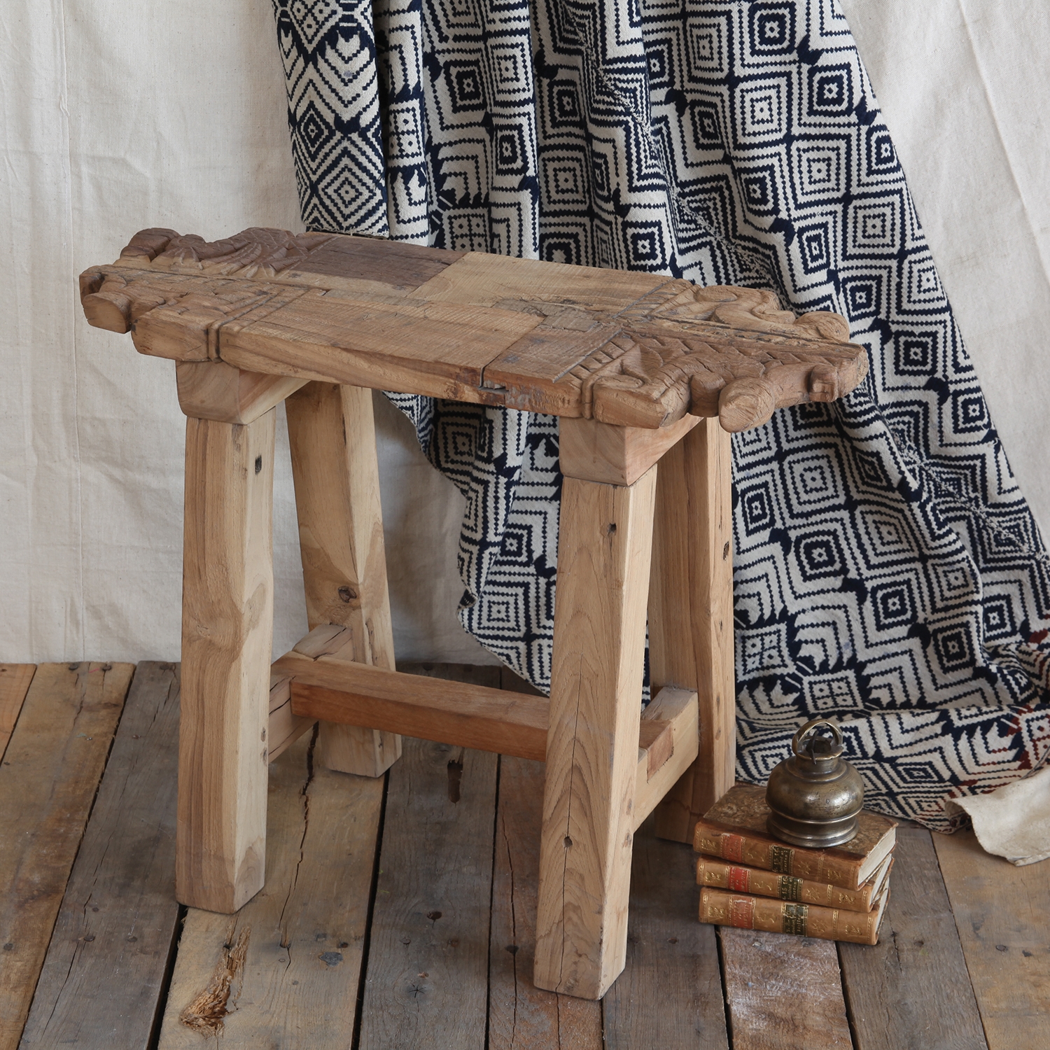 A small stool used as a nightstand