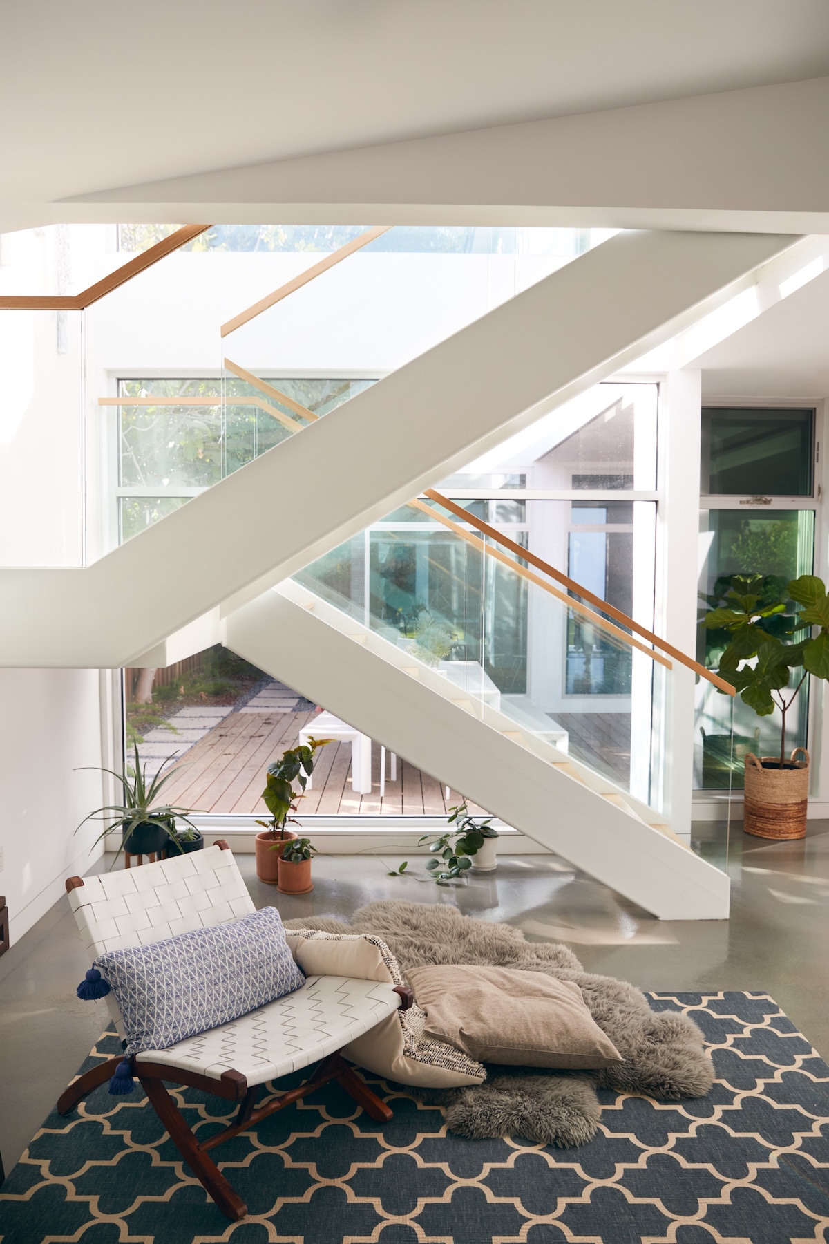 Layered rug living room idea 2